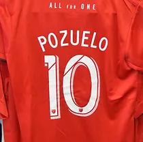 Custom t-shirt in red with a name and number on the back